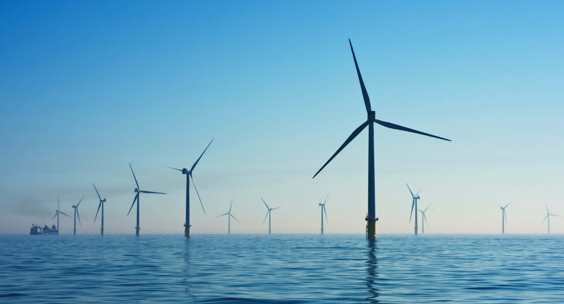 Hero Image for the home page showing wind turbines in the sea